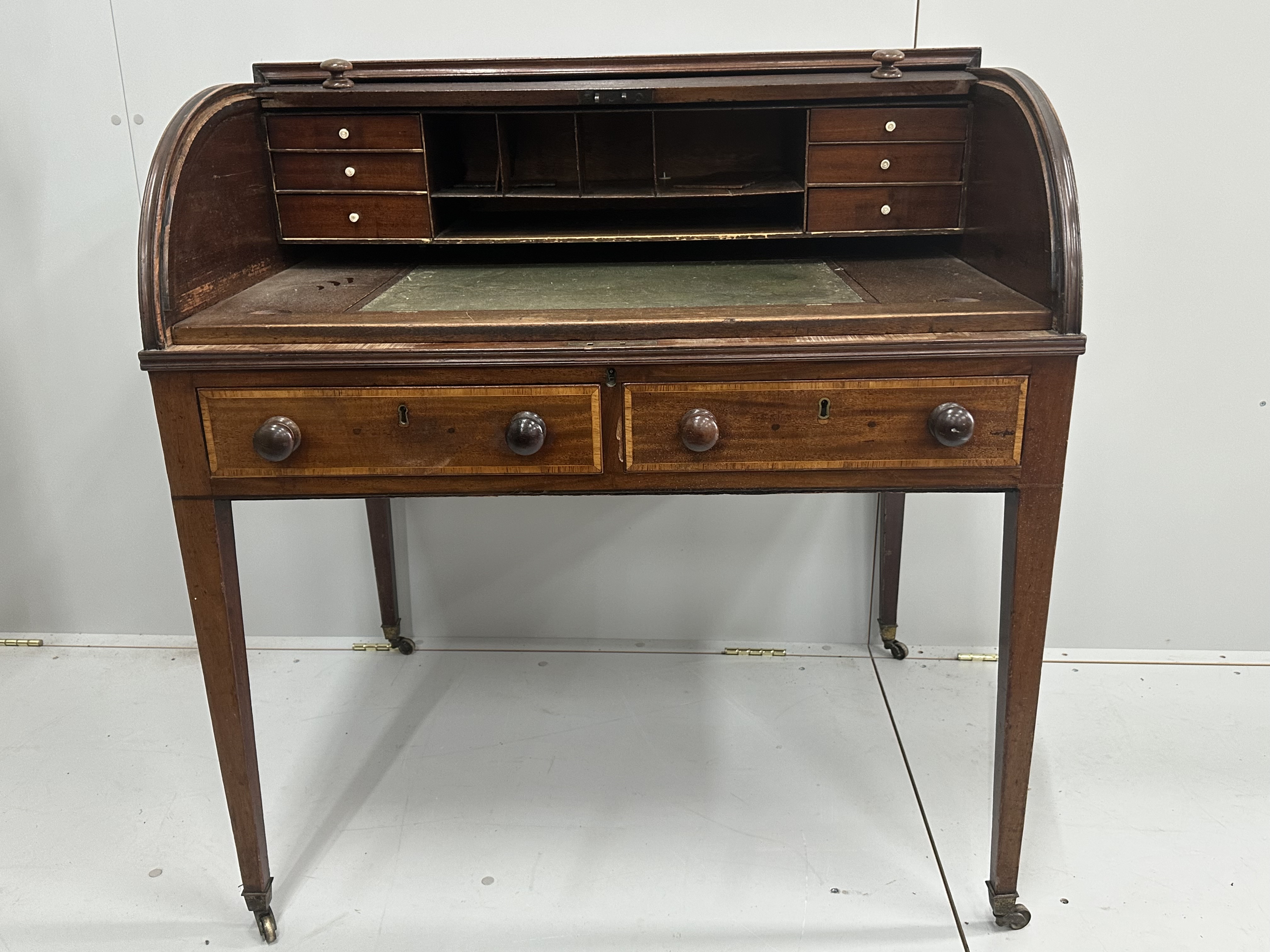 A George III mahogany tambour cylinder bureau, width 91cm, depth 70cm, height 99cm